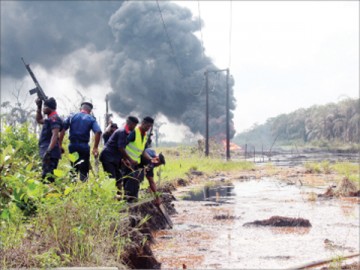 NSCDC OFFICIALS AT THE SCENE OF THE IJE-ODODO PIPELINE EXPLOSION
