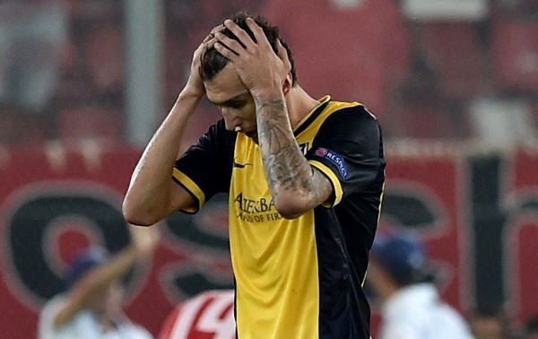Mario Mandzukic Broke His Nose During Atletico's 3-2 Loss at Olympiakos. Image: ARIS MESSINIS/AFP/Getty Images