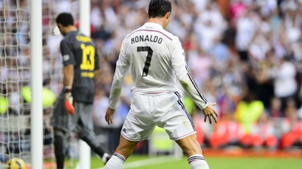 Cristiano Ronaldo Celebrates Scoring a Penalty Against Barcelona. Image: Getty.