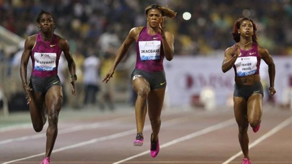 Blessing Okagbare Competing Against Shelly-Ann Fraiser-Pryce in Doha in 2014. Image: Getty.