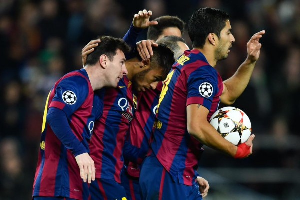 Lionel Messi Celebrates With His Barca Team-Mates After Restoring Parity at the Camp Nou. Image: Getty.