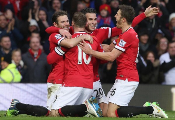 Manchester United Players Celebrates Robin van Persie's Third. Image: Getty.