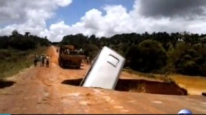 Brazilian-bus-falls-through-sinkhole-gets-carried-away-by-river