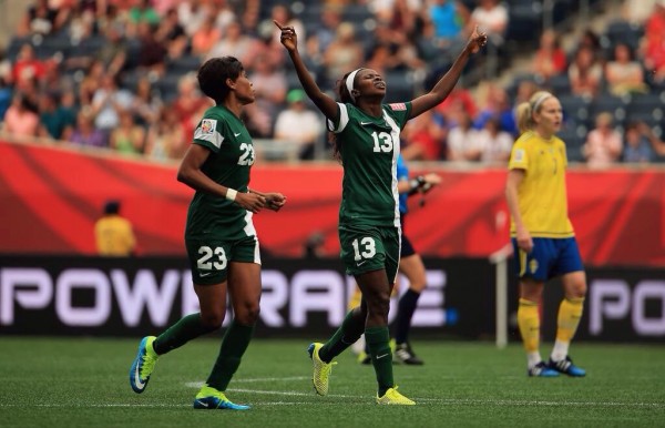 Ngozi Okobi Celebrates after Halving Nigeria's Deficit against Sweden. Image: Fifa via Getty.