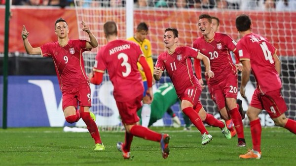 Serbia Players Celebrate Marksimorvic's Late Extra-Time Goal. Image: FIFA via Getty.