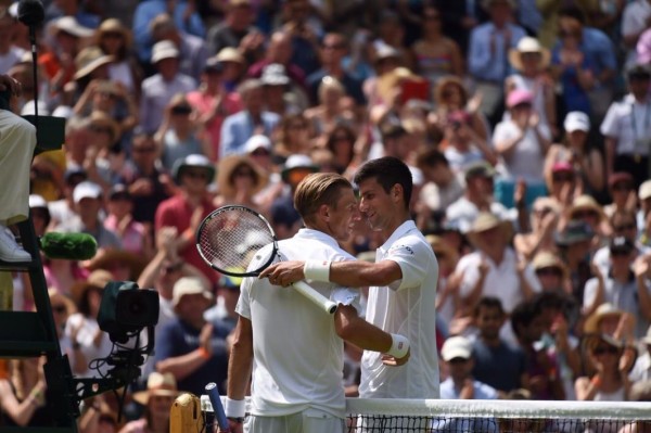 Novak Djokovic Congratulates Jarkko Nieminen On His Wimbledon Career. Image: AELTC.