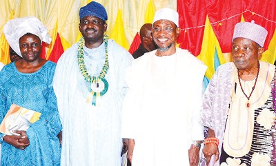 AREGBESOLA (SECOND RIGHT); ADESINA, (SECOND LEFT), HIS WIFE ADENIKE (LEFT) AND OBA AKUNRALEDOYE DURING THE RECEPTION FOR THE PRESIDENTIAL SPOKESMAN.