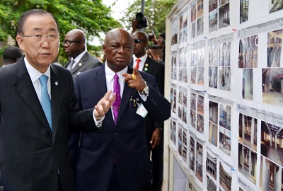 THE SECRETARY-GENERAL OF UNITED NATIONS (UN), MR BAN KIMOON (L) AND PERMANENT SECRETARY, FCT, MR JOHN CHUKWU, INSPECTING A PHOTO MONTAGE, BEING RECORD OF UNITED NATIONS BUILDING BOMBED THROUGH A CAR EXPLOSION IN AUGUST 2011, AT THE SITE IN ABUJA ON TUESDAY (24/8/15)