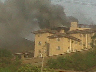 THICK SMOKE RISING FROM THE PENTHOUSE OF THE OBASANJO HILLTOP RESIDENCE