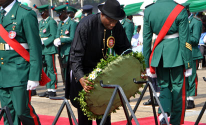 PRESIDENT GOODLUCK JONATHAN LAYING WREATH AT THE 2013 ARMED FORCES REMEMBRANCE DAY CELEBRATION IN ABUJA ON TUESDAY (15/1/13)