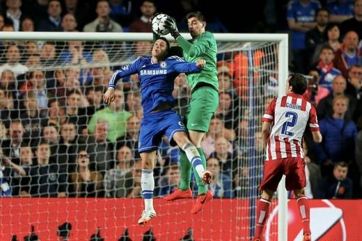 Thibault Courtois Saves the Ball Off a Fernando Torres Challenge During a Champions League Semi-Final Clash Between Atletico and Chelsea Last Season. Image: AFP/Getty.