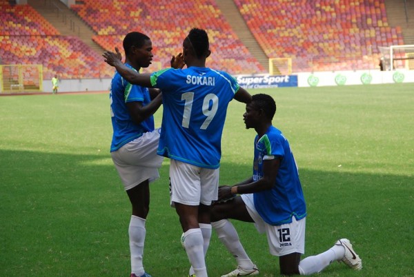 Kingsley Sokari Celebrates With Abdulrahaman Bashir During a Pre-Season Match in Abuja in 2014. Image: LMC.