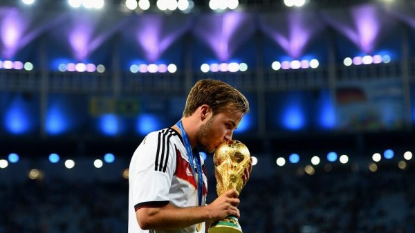 Mario Gotze Kisses The World Cup Trophy. Image: Fifa via Getty Image.