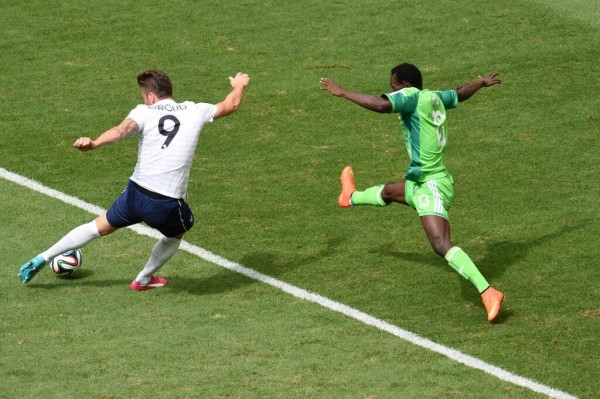 Juwon Oshaniwa Stretches to Deny Olivier Giroud a Shot at Super Eagles Goal. Image: Getty.