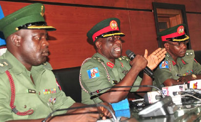 PUBLIC RELATIONS OFFICER, OFFICE OF THE CHIEF OF ARMY STAFF, LT.-COL. AMINU ILIYASU; DIRECTOR, ARMY PUBLIC RELATIONS, BRIG.-GEN. OLAJIDE LALEYE AND CHIEF OF STAFF, DIRECTORATE OF ARMY PUBLIC RELATIONS, AT A NEWS CONFERENCE ON ARMY OFFICERS CONFERENCE IN ABUJA ON FRIDAY