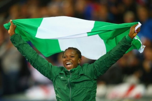 Ese Brume Celebrates Winning Gold in Long Jump at the Glasgow Commonwealth Games. Image: Getty.