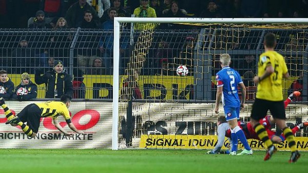 Ilkay Gundogan's Diving Header Sealed a Much-Needed Victory for Dortmund on Friday. Image: Reuters.