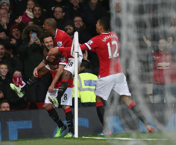 Juan Mata Celebrates With Ashley Young and Chris Smalling After Scoring Man Utd's Match-Winner. Image: Getty.