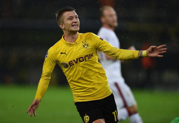 Marco Reus Celebrates Scoring for Dortmund in a Champions League Game This Season. Image: Getty.