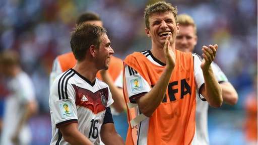 Thomas Mueller and Captain Philip Lahm Celebrates After Germany's Victory Over Portugal. Image: Getty.