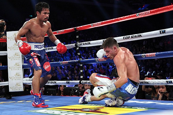 Manny Pacquaio Scored Six Knockdowns to Claim a Lopsided Victory via Unanimous Decision against Chris Algieri to Retain His WBO Welterweight Title in November, 2014. 