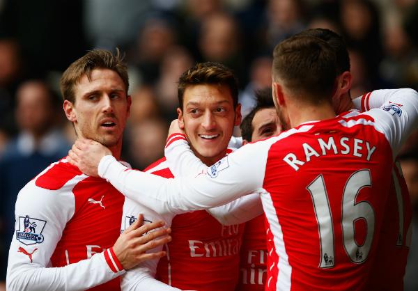 Arsenal Celebrate Mesut Ozil's Goal at White hart Lane. Image: Getty.