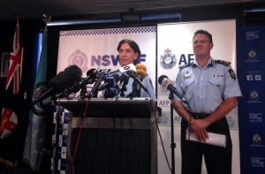 Australian Federal Police Deputy Commissioner Michael Phelan listens as New South Wales Deputy Police Commissioner Catherine Burn speaks during a media conference in Sydney