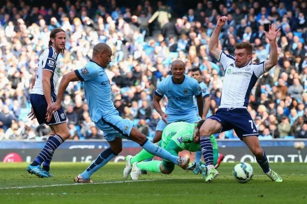 Fernando Tucks In Man City's Second Goal Against West Brom- The Champions' 1000th Premier League Goal. Image: Getty.