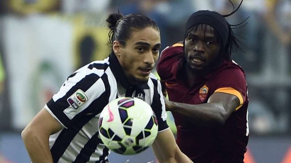 Martin Caceres Vies for the Ball With Gervinho During a Serie A Game. Image: AFP. 