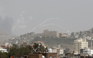 Rockets fly from missile base which was hit by an air strike in Yemen's capital Sanaa