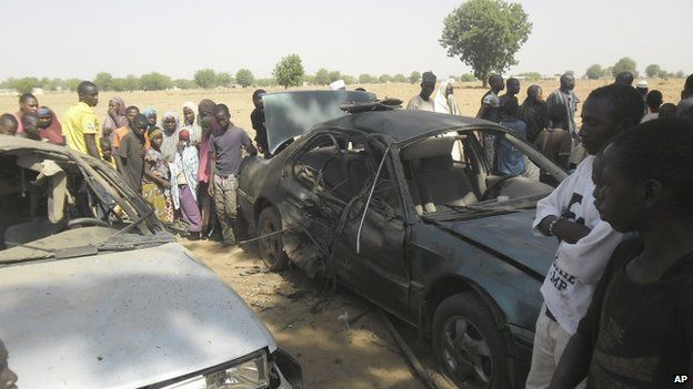 A suicide bomber blows himself up in a car at the business college