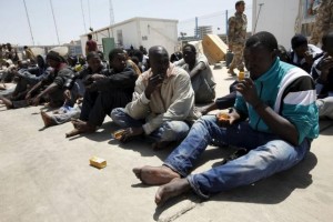 Illegal migrants who attempted to flee the coast to Europe are seen at the Libyan Navy base in the the coastal city of Tripoli May 5, 2015. REUTERS/Ismail Zitouny