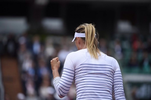 Maria Sharapova Pumps Her Fist after Straight Sets Defeat of Samantha Stossur in the Third Round of the 2015 French Open. Image: RG via Getty. 