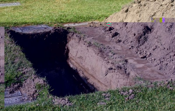 Calabar Village Head Jumps Into Graves To Stop Burial Of Couple