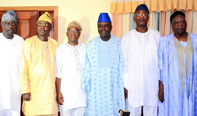 SECRETARY TO THE STATE GOVERNMENT OF OSUN, ALHAJI MOSHOOD ADEOTI (2ND RIGHT), REPRESENTING THE GOVERNOR; SENATE DELEGATION LEADER TO OSUN, SENATOR ABDULLAHI ADAMU (RIGHT), OTHER SENATORS AND OFFICIALS OF OSUN GOVERNMENT DURING THE PRESENTATION OF THE SENATE CONDOLENCE LETTER TO THE GOVERNOR ON THE DEATH OF OONI OF IFE, OBA OKUNADE SIJUWADE, AT GOVERNMENT HOUSE, OSOGBO ON THURSDAY.