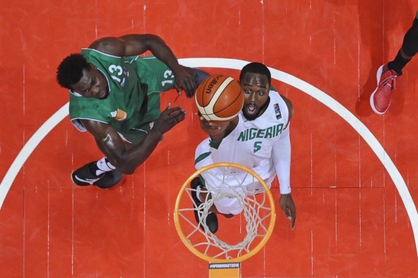 Nigeria's Mike Umeh Goes for a Basket against the Central African Republic. Image Credit: twitter/NigeriaBasket