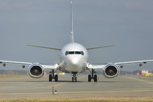 White jet passenger or cargo plane on runway