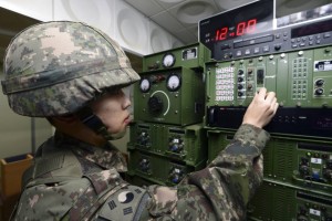 A South Korean soldier adjusts equipment used for the propaganda broadcasts at a studio near the border between South Korea and North Korea in Yeoncheon, South Korea, Friday, Jan. 8, 2016. South Korea responded to North Korea's nuclear test with broadcasts of anti-Pyongyang propaganda across the rival's tense border Friday, believed to be the birthday of North Korean leader Kim Jong Un. (Lim Tae-hoon/Newsis via AP) KOREA OUT