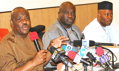 FROM LEFT: GOV NYESOM WIKE OF RIVERS STATE; GOV OKEZIE IKPEAZU OF ABIA STATE AND THE SENATE MINORITY LEADER, SEN GODSWILL AKPABIO, DURING THE NEWS CONFERENCE ON THE PEOPLES DEMOCRATIC PARTY'S (PDP) NATIONAL CONVENTION IN PORT-HARCOURT.