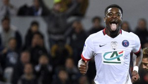 Paris Saint-Germain's Ivorian defender Serge Aurier sticks his tongue out after missing a goal during the French Cup semi-final football match between Lorient (FCL) and Paris Saint-Germain (PSG) at Moustoir stadium in Lorient, western France, on April 19, 2016. AFP PHOTO / DAMIEN MEYER / AFP / DAMIEN MEYER (Photo credit should read DAMIEN MEYER/AFP/Getty Images)