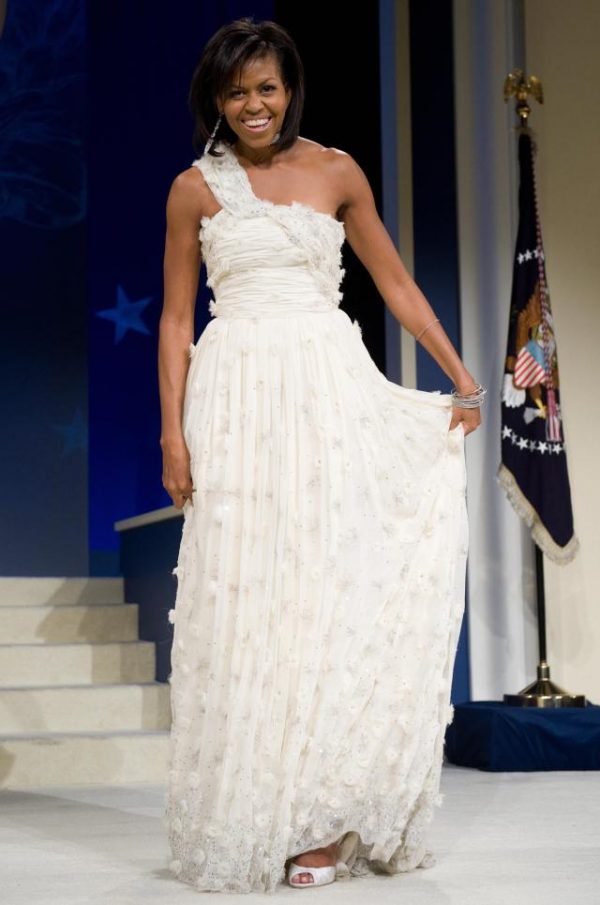 First Lady Michelle Obama poses during the Midatlantic Regional Inaugural Ball at the Washington Convention Center in Washington, DC, January 20, 2009. Obama was sworn in as the 44th US president earlier in the day. AFP PHOTO / Saul LOEB (Photo credit should read SAUL LOEB/AFP/Getty Images)