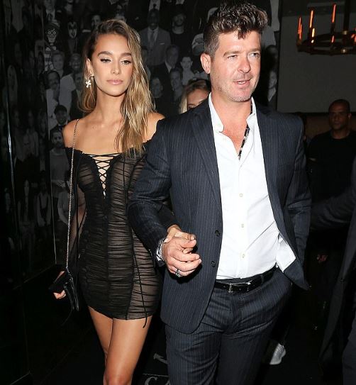Robin Thicke expecting first child with 22 year old girlfriend.