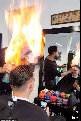Meet Demirel, The Strange Barber Who Uses Fire To Cut His Clients' Hair  (Photos) - Information Nigeria