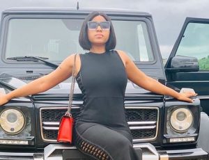 Regina Daniels Flaunts Her Car And Customized Plate Number In New photos