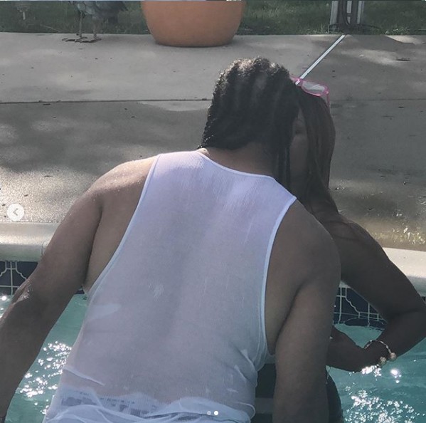 [PHOTOS]: Regina Askia Shows Off Her Banging Body As She Kisses Her Man In The Pool