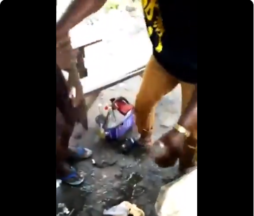 [Video]: Nigerians Nab 'Aboki' Selling Concentrated Drink Strong Enough To Melt A Disposable Plate