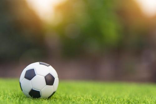 A soccer ball on the pitch