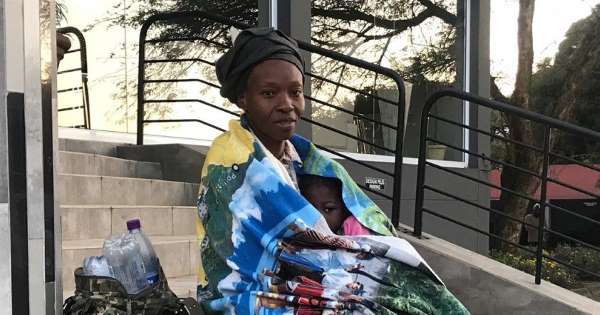 The unnamed Nigerian woman in front of the consulate at Sandton, South Africa on Friday.