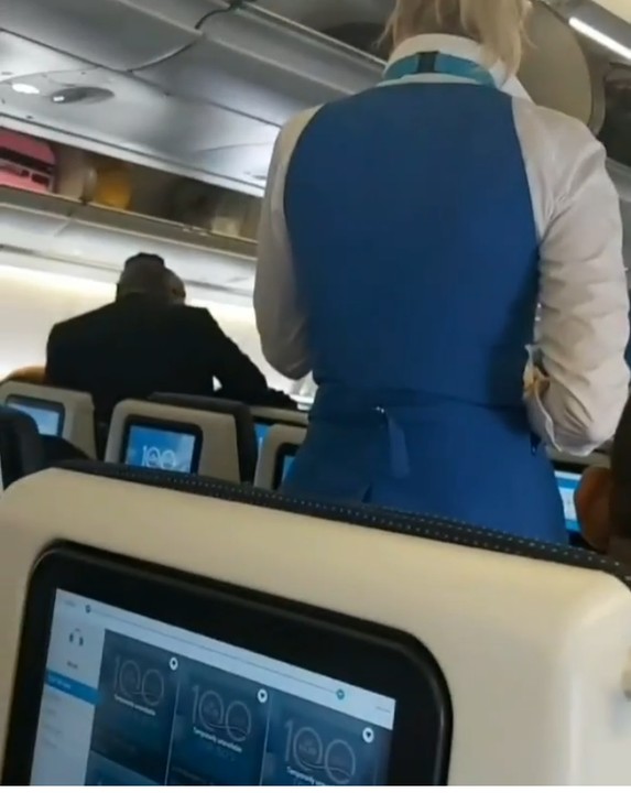 The elderly Nigerian man shouting at the air hostess