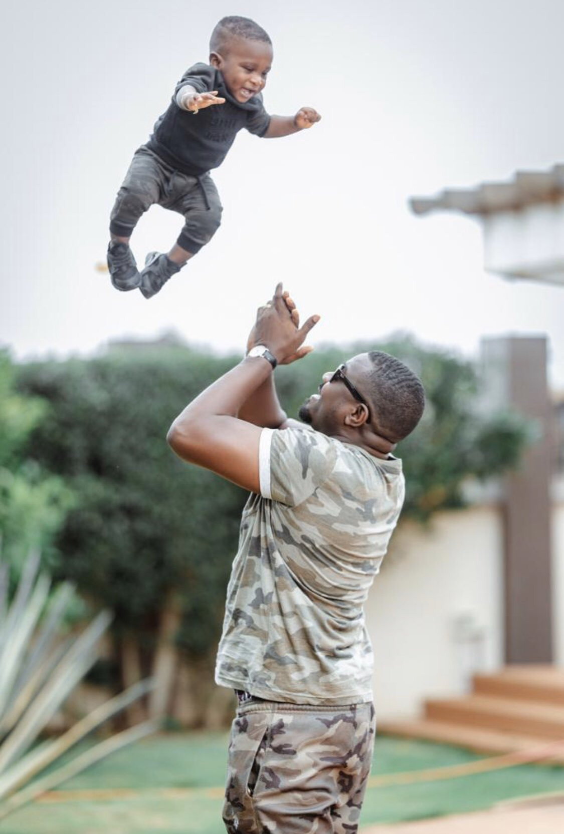 John Dumelo and son